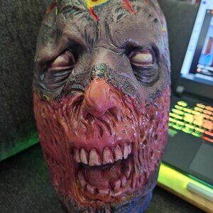 Burning hanging head from Spirit Halloween